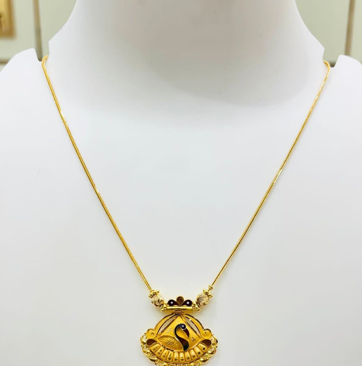 Peacock Chain with Ruby-Tipped Tassels